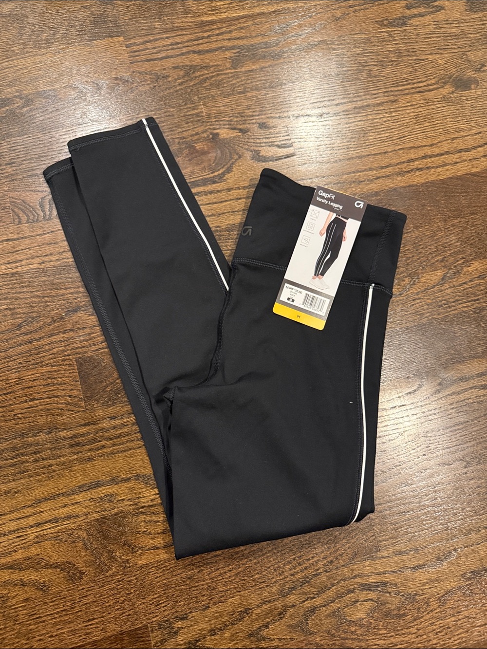 Woman’s medium Gapfit leggings Black Joggers with White Contrast Piping